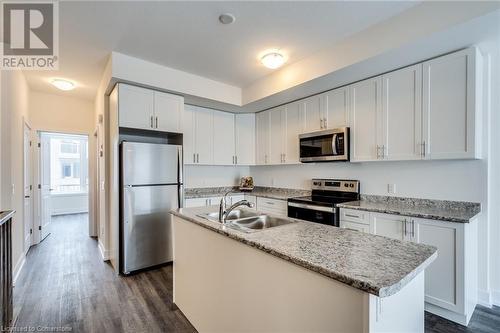 261 Skinner Road Unit# 1, Waterdown, ON - Indoor Photo Showing Kitchen With Double Sink With Upgraded Kitchen