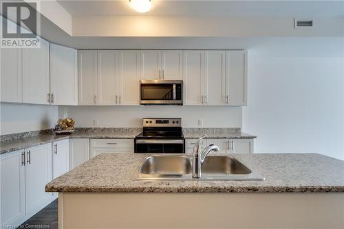 261 Skinner Road Unit# 1, Waterdown, ON - Indoor Photo Showing Kitchen With Double Sink With Upgraded Kitchen