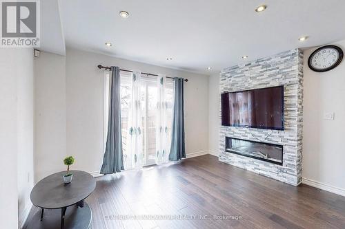 18 - 1635 Pickering Parkway, Pickering, ON - Indoor Photo Showing Living Room With Fireplace