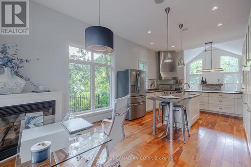 14 Gibbons Place, London, ON - Indoor Photo Showing Kitchen With Fireplace With Upgraded Kitchen