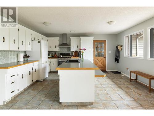 10108 Venables Drive, Coldstream, BC - Indoor Photo Showing Kitchen With Double Sink