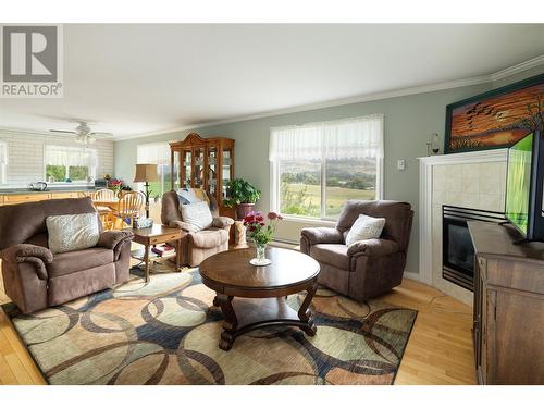 10108 Venables Drive, Coldstream, BC - Indoor Photo Showing Living Room With Fireplace