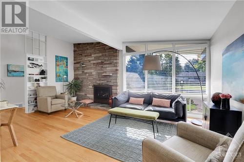 13 Redfield Avenue, Ottawa, ON - Indoor Photo Showing Living Room With Fireplace