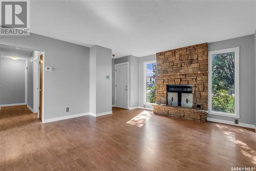 522 W Avenue S, Saskatoon, SK - Indoor Photo Showing Living Room With Fireplace