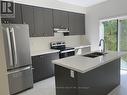 30 Lahey Crescent, Penetanguishene, ON  - Indoor Photo Showing Kitchen With Stainless Steel Kitchen With Double Sink 