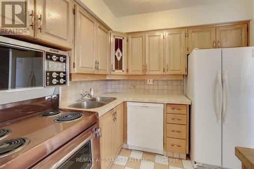 912 - 60 Southport Street, Toronto (High Park-Swansea), ON - Indoor Photo Showing Kitchen With Double Sink