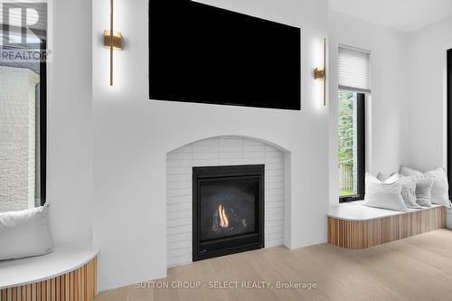 46 Exmoor Place, London, ON - Indoor Photo Showing Living Room With Fireplace