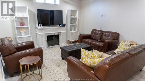 1866 Queens Valley Drive, Kingsville, ON - Indoor Photo Showing Living Room With Fireplace