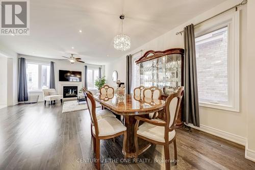 152 Frederick Pearson Street, East Gwillimbury, ON - Indoor Photo Showing Dining Room With Fireplace