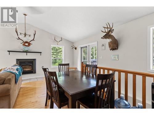 2234 Progress Road, Prince George, BC - Indoor Photo Showing Dining Room With Fireplace