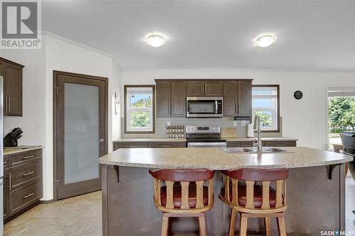 143 Marine Drive, Island View, SK - Indoor Photo Showing Kitchen With Double Sink