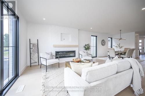 769 Gatestone Road, London, ON - Indoor Photo Showing Living Room With Fireplace