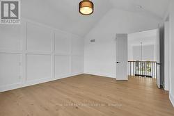 PRIMARY BEDROOM VIEW TO 2 STORY FOYER - 