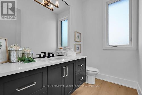 MAIN FLOOR POWDER ROOM - 868 Eagletrace Drive, London, ON - Indoor Photo Showing Bathroom