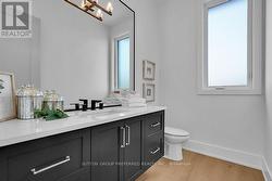 MAIN FLOOR POWDER ROOM - 