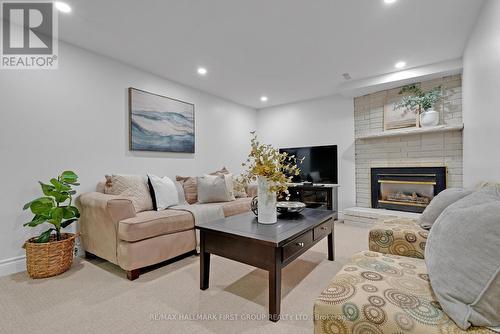 25 Habitant Crescent, Whitby (Lynde Creek), ON - Indoor Photo Showing Living Room With Fireplace