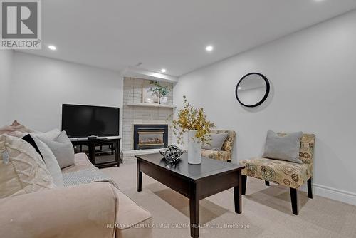 25 Habitant Crescent, Whitby (Lynde Creek), ON - Indoor With Fireplace