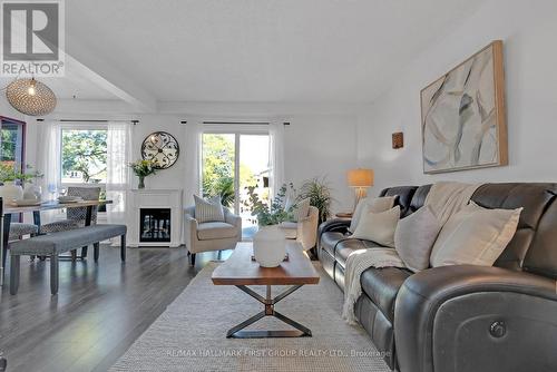 25 Habitant Crescent, Whitby (Lynde Creek), ON - Indoor Photo Showing Living Room With Fireplace