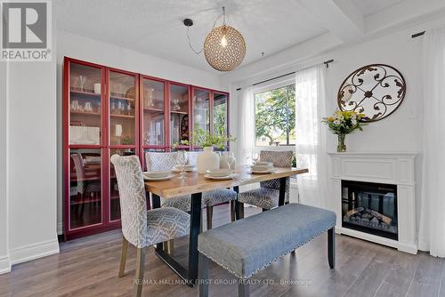 25 Habitant Crescent, Whitby (Lynde Creek), ON - Indoor Photo Showing Dining Room With Fireplace