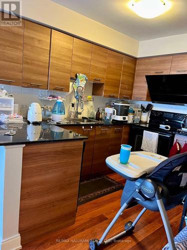 1018 - 135 Village Green Square, Toronto, ON - Indoor Photo Showing Kitchen With Double Sink