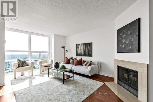 2309 - 131 Beecroft Road, Toronto (Lansing-Westgate), ON - Indoor Photo Showing Living Room With Fireplace