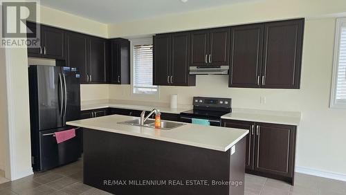 8 Tomporowski Trail, New Tecumseth, ON - Indoor Photo Showing Kitchen With Double Sink