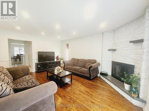 43 Dunwatson Drive, Toronto (Centennial Scarborough), ON - Indoor Photo Showing Living Room With Fireplace