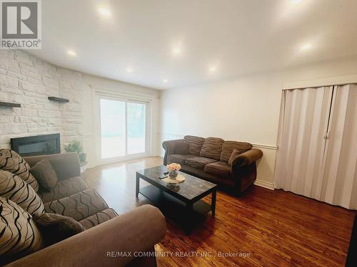 43 Dunwatson Drive, Toronto (Centennial Scarborough), ON - Indoor Photo Showing Living Room With Fireplace