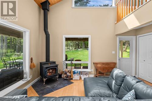 825 Cedar Bough Spur, Sidney Island, BC - Indoor Photo Showing Other Room With Fireplace