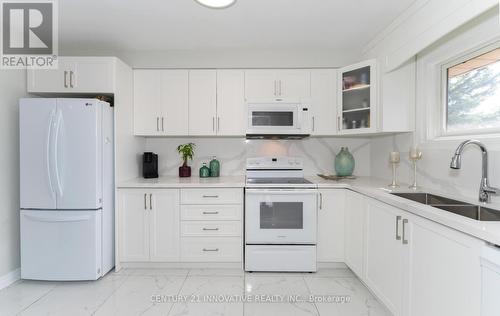 138 Ashton Crescent, Brampton (Central Park), ON - Indoor Photo Showing Kitchen With Double Sink