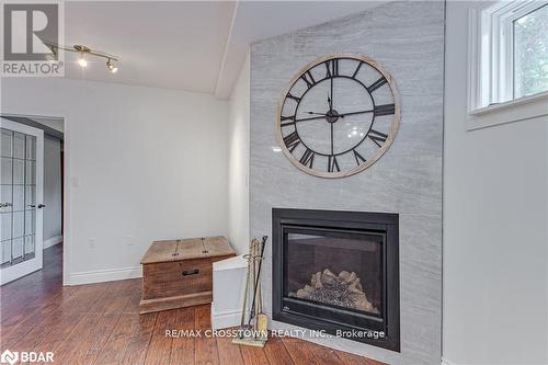 1104 Alfred Street, Innisfil, ON - Indoor Photo Showing Living Room With Fireplace