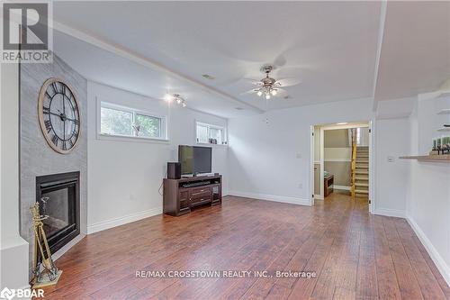 1104 Alfred Street, Innisfil, ON - Indoor Photo Showing Living Room With Fireplace