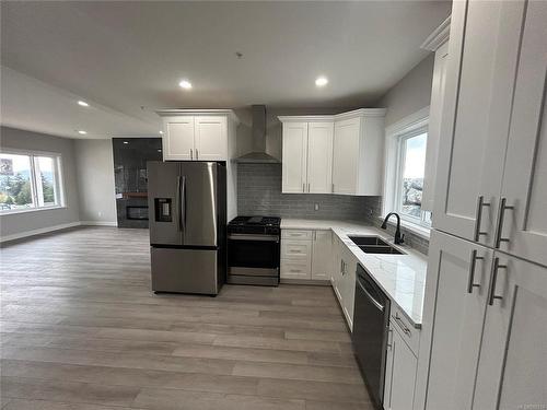 7059 Brailsford Pl, Sooke, BC - Indoor Photo Showing Kitchen With Double Sink With Upgraded Kitchen