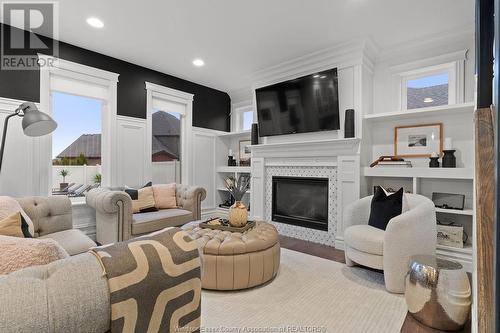 544 River Downs Avenue, Lakeshore, ON - Indoor Photo Showing Living Room With Fireplace