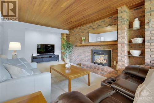 17 Grouse Avenue, Ottawa, ON - Indoor Photo Showing Living Room With Fireplace