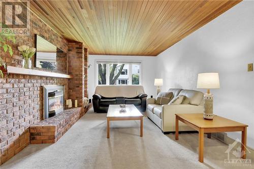 17 Grouse Avenue, Ottawa, ON - Indoor Photo Showing Living Room With Fireplace