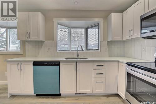 23 Donahue Avenue, Regina, SK - Indoor Photo Showing Kitchen With Double Sink