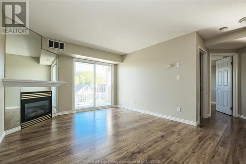 1323 Langlois Avenue Unit# 301, Windsor, ON - Indoor Photo Showing Living Room With Fireplace