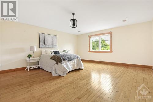 Birch hardwood floors in the loft! - 4207 Limestone Road, Ottawa, ON - Indoor Photo Showing Bedroom