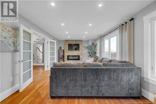 1 Cambridge Avenue, Quispamsis, NB - Indoor Photo Showing Living Room With Fireplace