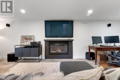 4566 Harwood Road, Hamilton Township, ON - Indoor Photo Showing Living Room With Fireplace