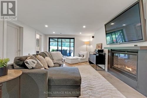 4566 Harwood Road, Hamilton Township, ON - Indoor Photo Showing Living Room With Fireplace