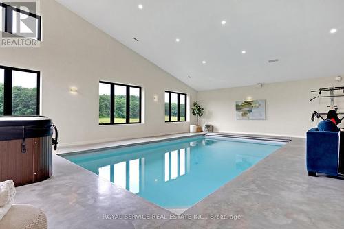 4566 Harwood Road, Hamilton Township, ON - Indoor Photo Showing Other Room With In Ground Pool