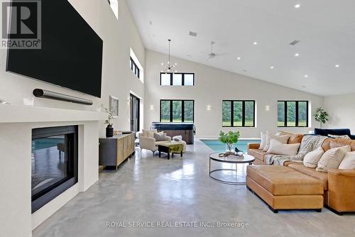 4566 Harwood Road, Hamilton Township, ON - Indoor Photo Showing Living Room With Fireplace