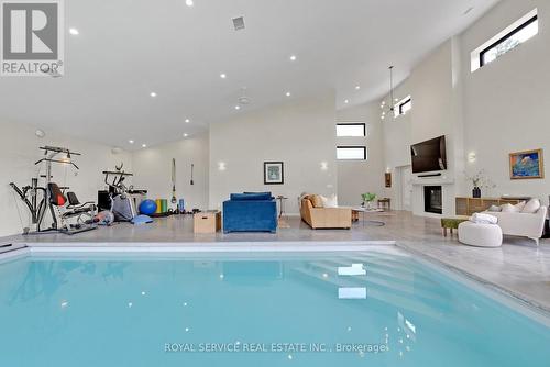 4566 Harwood Road, Hamilton Township, ON - Indoor Photo Showing Other Room With In Ground Pool