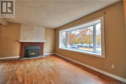 88 Edgett Avenue, Moncton, NB - Indoor Photo Showing Living Room With Fireplace