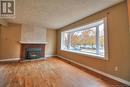 88 Edgett Avenue, Moncton, NB  - Indoor Photo Showing Living Room With Fireplace 