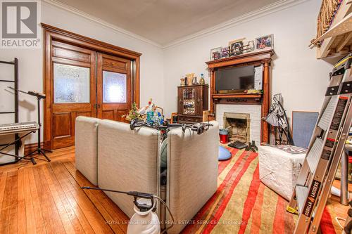 171 Bay Street S, Hamilton, ON - Indoor With Fireplace