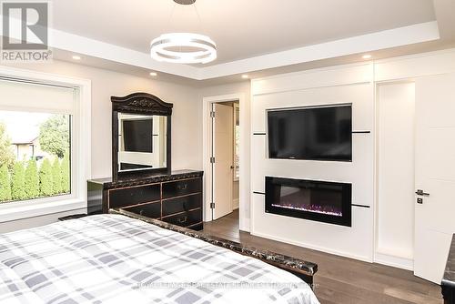 411 Targa Road, Mississauga, ON - Indoor Photo Showing Bedroom With Fireplace