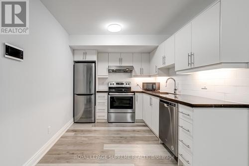 Bsmt - 90 Laughton Avenue, Toronto, ON - Indoor Photo Showing Kitchen With Stainless Steel Kitchen